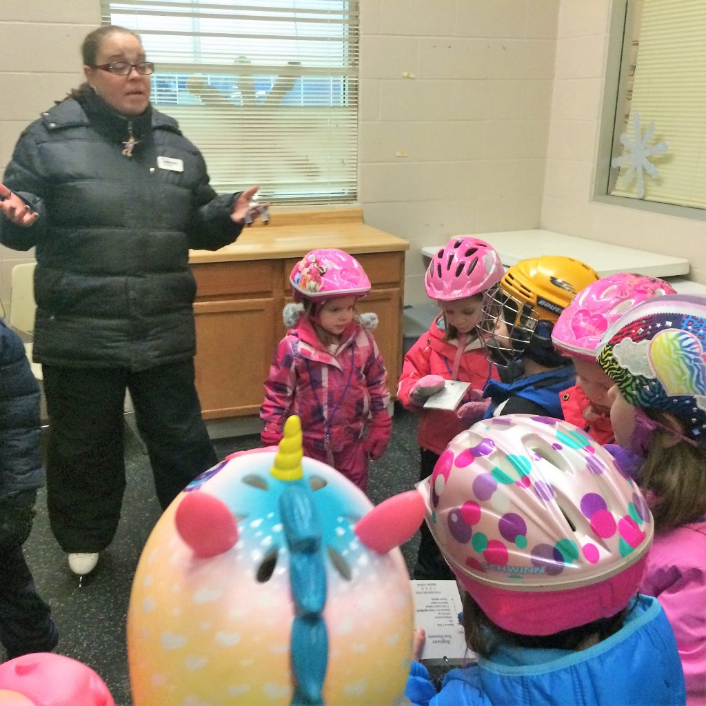 Beginning Skate School class gathers off-ice